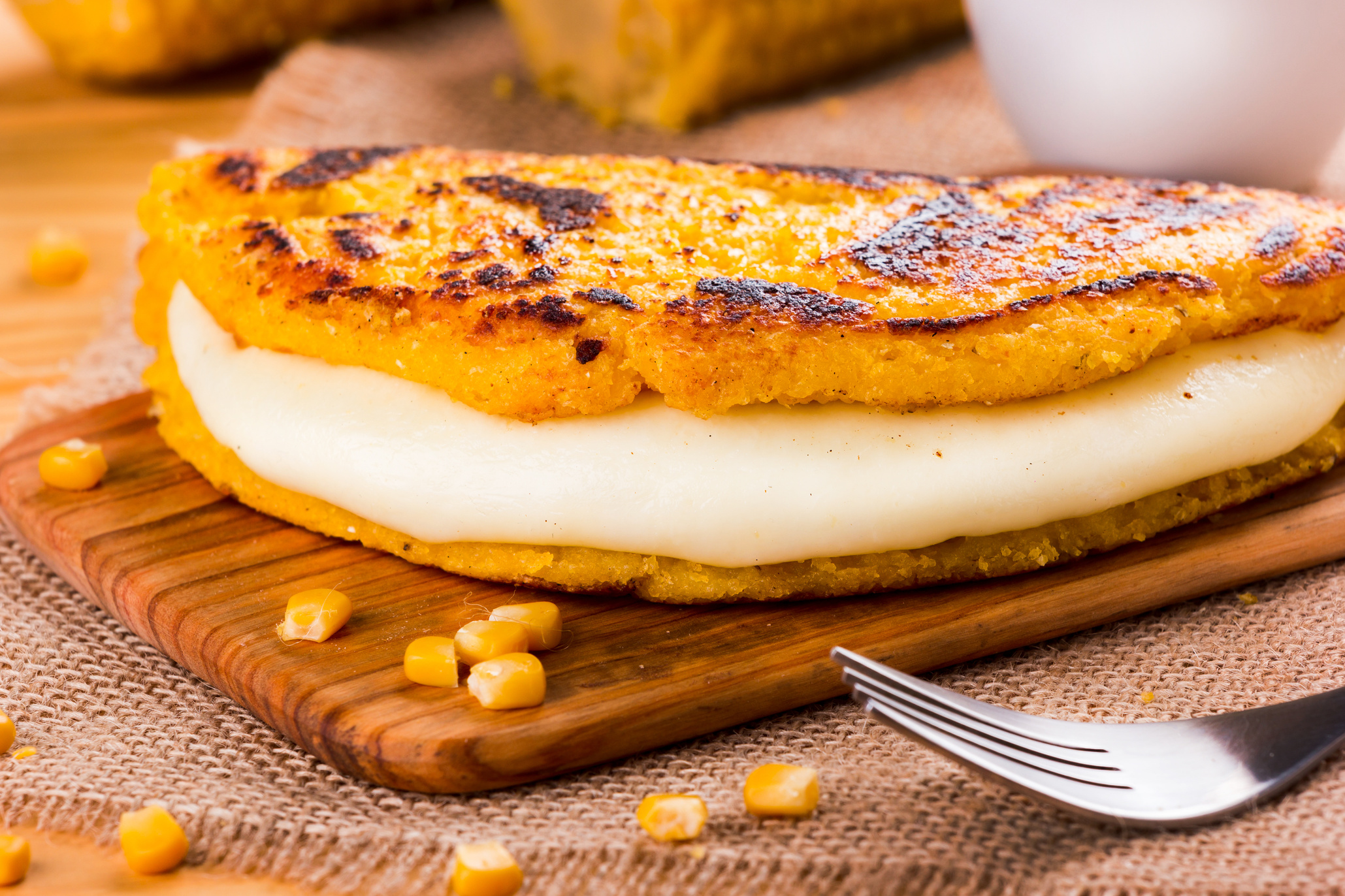 Cachapa with cheese, typical Venezuelan dish made with corn, cheese and butter